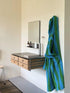 Ultra-soft retro whimsical stripe bath robe by Inspecial Home, made from 100% organic long-staple cotton, perfect for cozy home decor.