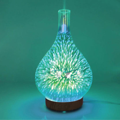 Ozdingo 3D Fireworks mirror ultrasonic aroma diffuser with glass body, LED lamp, and essential oil vapor for home aromatherapy.