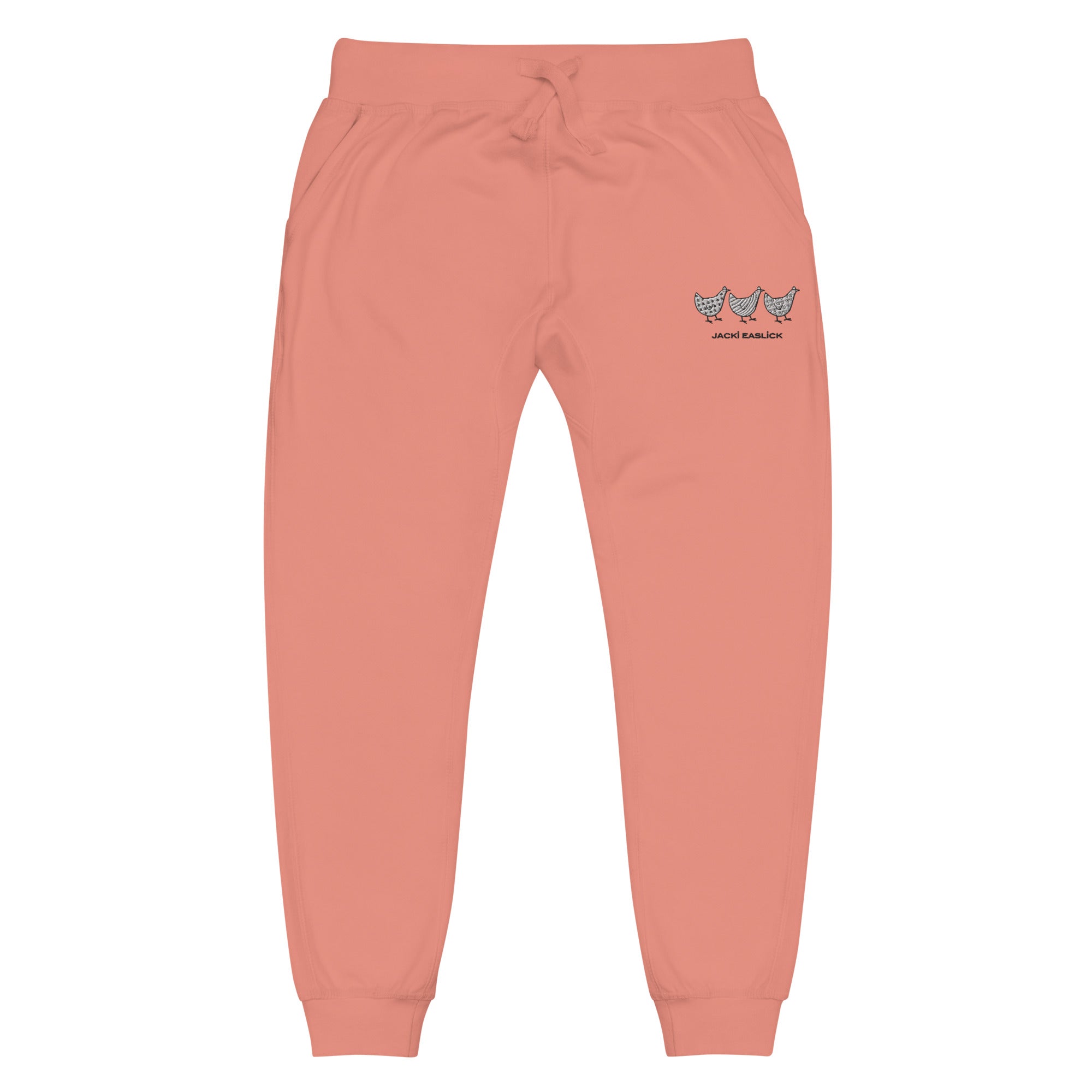 Unisex dusty rose fleece sweatpants with Jacki Easlick Three Chickens design by Yellow Eleusis, front view.