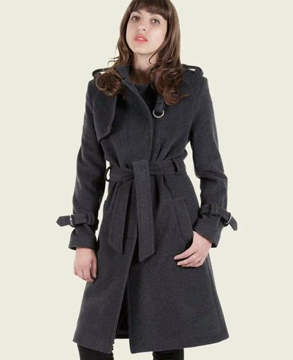 Grey collarless trench coat by Rose Eleusis, tailored stylish design, displayed on a hanger.