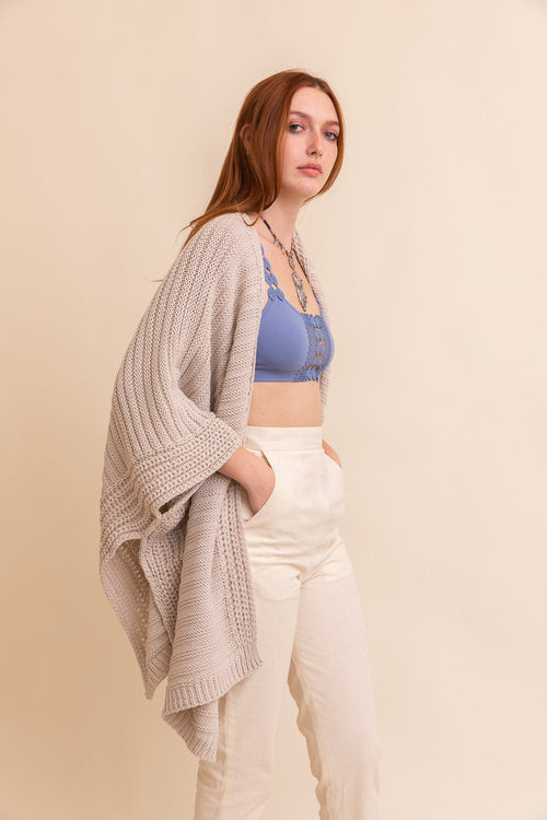Oatmeal ribbed knit ruana by Periwinkle Aether, versatile accessories wrap for stylish layering and everyday fashion.