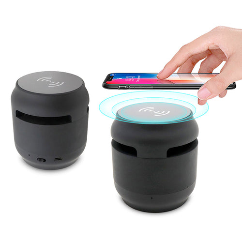 Copper Hecuba Bluetooth speaker with fabric exterior and wireless charging pad, portable mobile and laptop accessory.