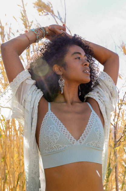 Sage green Periwinkle Aether lace brami with waistband loop, stretchy feminine cami top, designed for comfort and style.