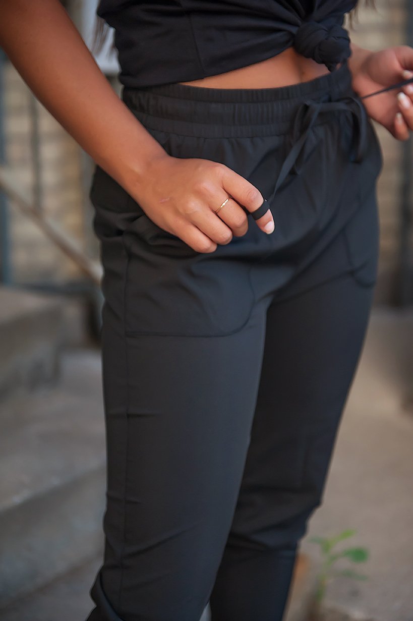 Lavender Danae DT UPTOWN lightweight black joggers for women, featuring a relaxed fit and elastic waistband.