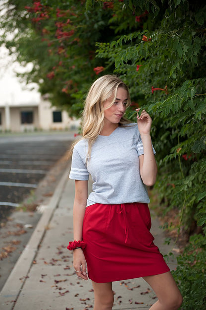 Lavender Danae DT BREEZE sporty red skirt for women, lightweight athletic skirt with a fitted waistband and stylish design.