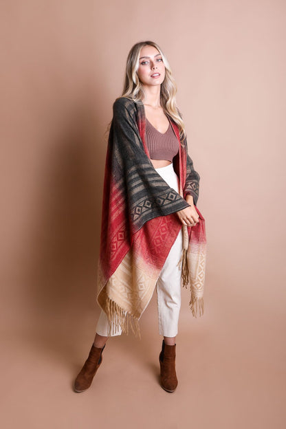 Colorful Western-style tassel serape with vibrant colorblend patterns, designed as a stylish accessory by Periwinkle Aether.