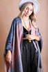 Colorful pink Western-style tassel serape accessory with vibrant blend of colors, featuring decorative tassels from Periwinkle Aether.