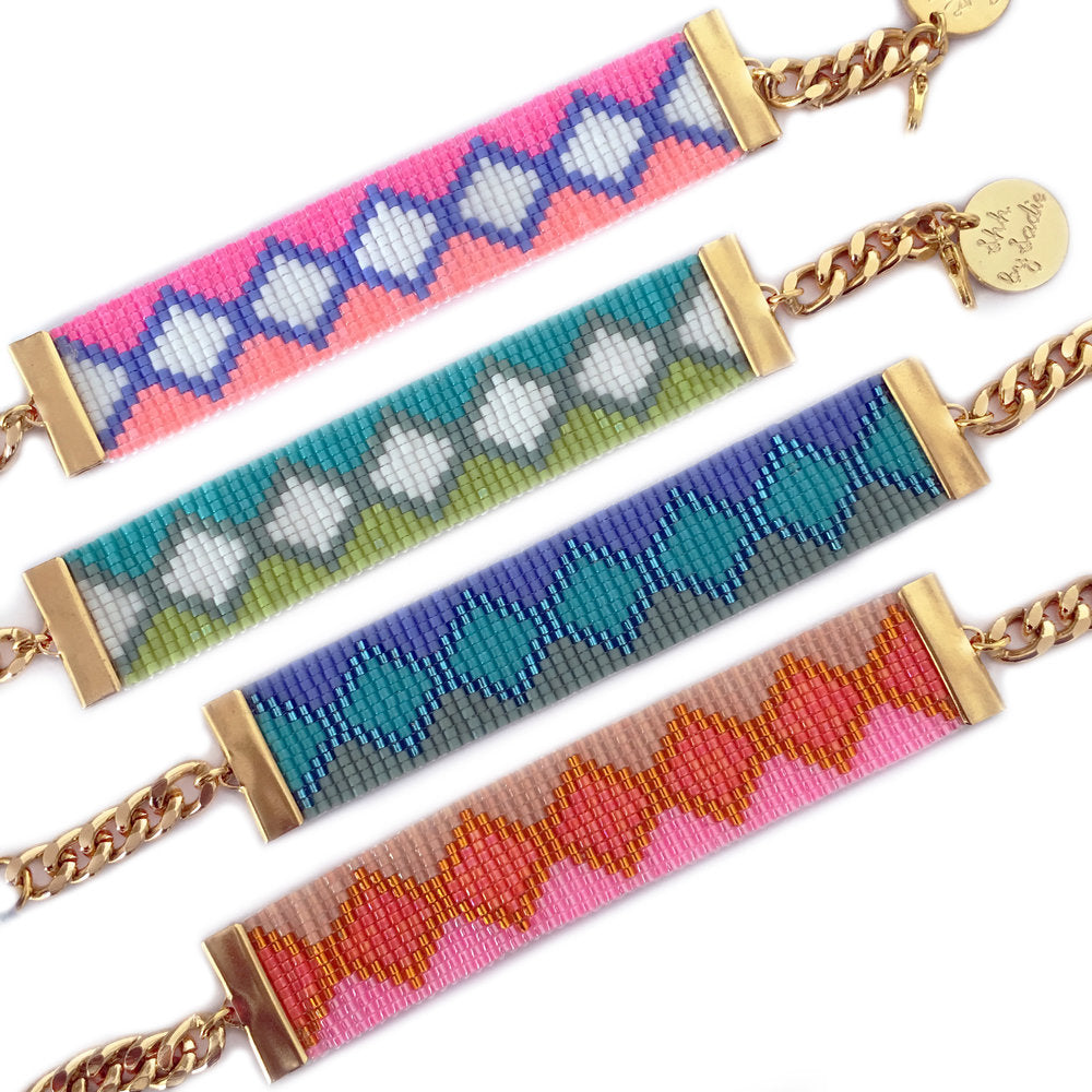Yellow Athena Rio and Ibiza bracelets displayed on a white background, showcasing their stylish designs and vibrant colors.