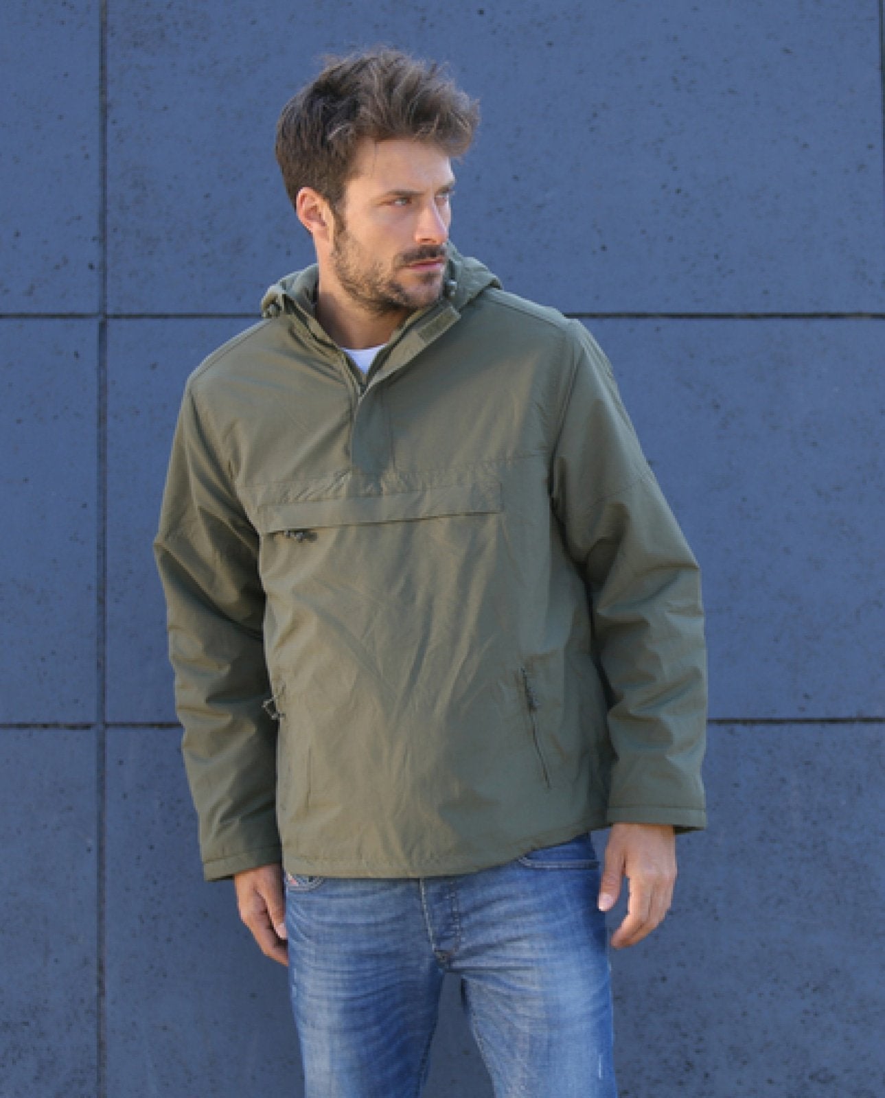 Callisto Essential Windbreaker in assorted colors, lightweight jacket with a sporty design and adjustable hood.