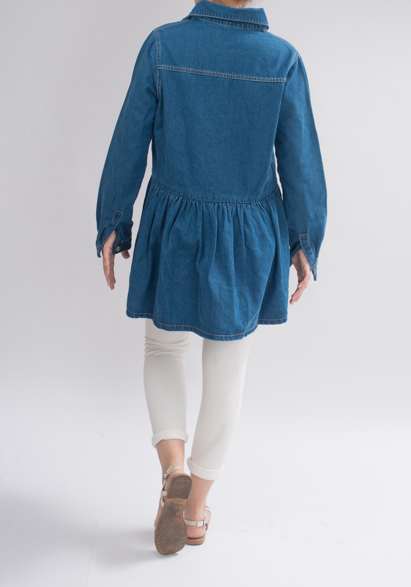 Women wearing Jade Eurynome stylish denim dress, back view, showcasing casual fit and vibrant blue denim fabric.