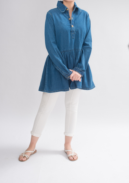 Women wearing a stylish denim dress from Jade Eurynome, showcasing the casual yet chic denim top in a natural pose.