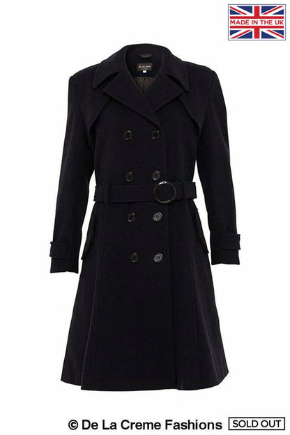 Navy faux wool blend double-breasted coat by Rose Eleusis, shown on a model, with classic lapels and button details.