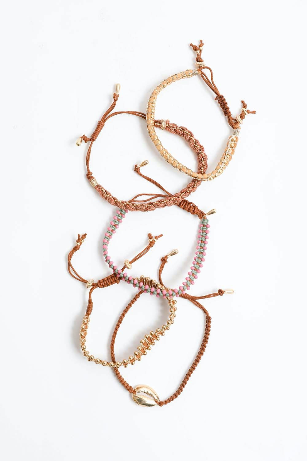 Woven stackable beaded bracelet from Periwinkle Aether, featuring colorful beads and a stylish, handcrafted accessory design.