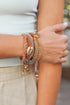 Woven stackable beaded bracelet from Periwinkle Aether featuring colorful beads and intricate woven design.