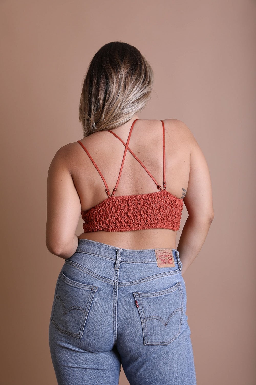 Plus crochet lace longline bralette from Periwinkle Aether featuring padded crochet lace design and a longline silhouette.