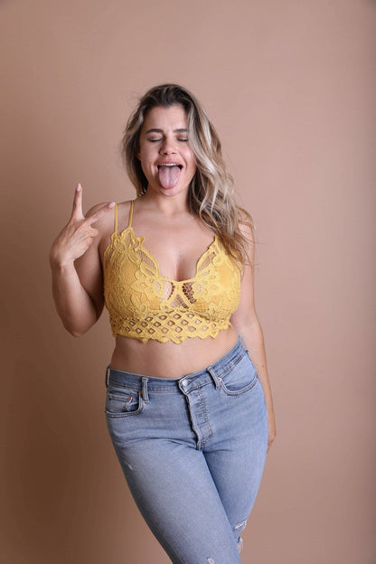 Plus crochet lace longline bralette from Periwinkle Aether featuring padded crochet lace design, styled as a cozy accessories piece.