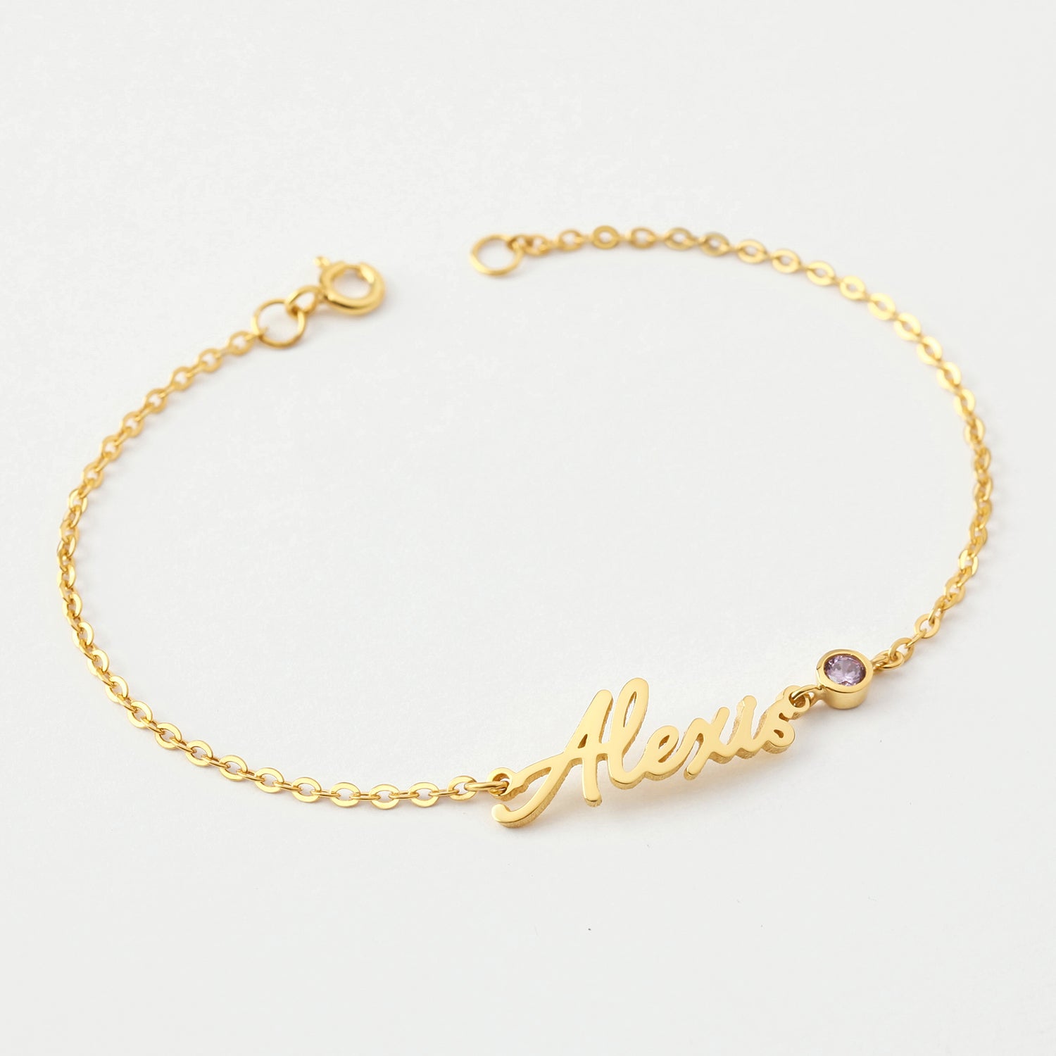 Cursive personalized name bracelet by Green Millie, a stylish jewelry piece for tween girls featuring custom engraved name.
