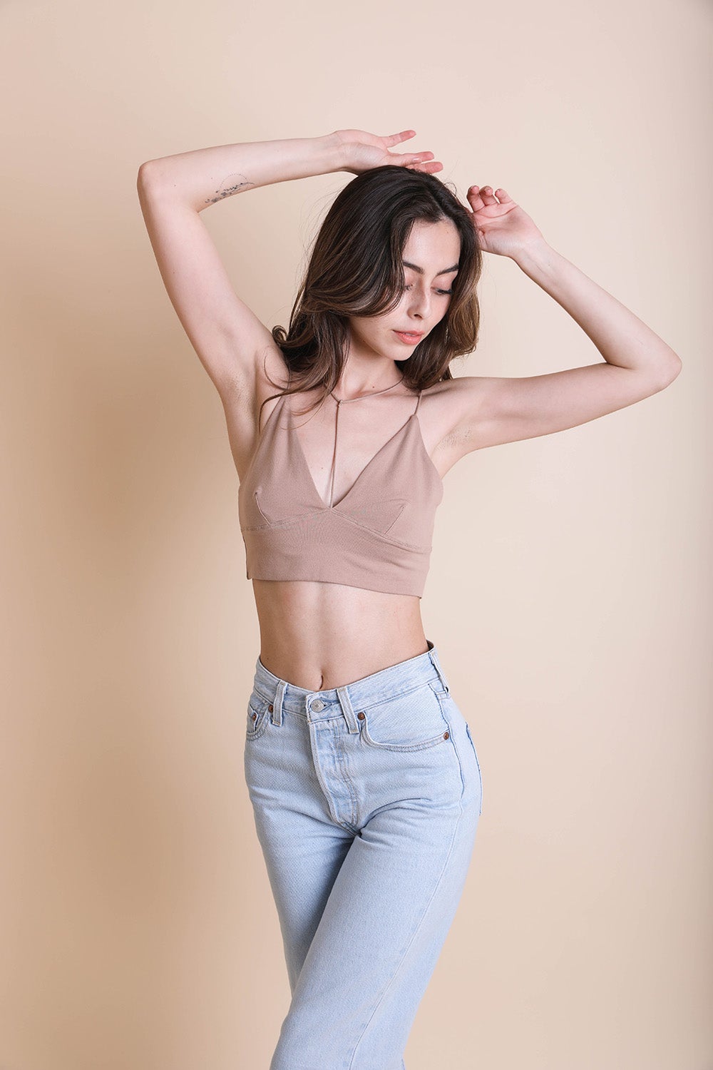 Small mocha Y-neck plunge crop top from Periwinkle Aether, featuring a stylish cut and fitted design.