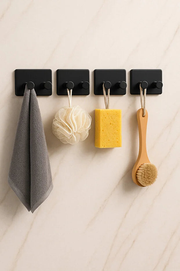 Gold Penelope 4-pack self-adhesive wall hooks for bathroom and kitchen, easy to install tech accessories organization.