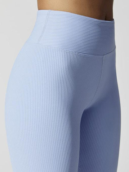 Skyblue shorts from Year of Ours featuring a relaxed fit, designed by Sky Felix, shown on a model in a casual outdoor setting.