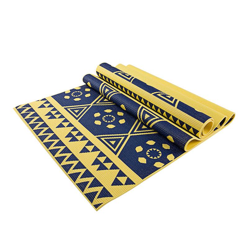 Yellow printed PVC premium yoga mat from Azure Jason, showing textured surface and colorful printed design for outdoor exercise.