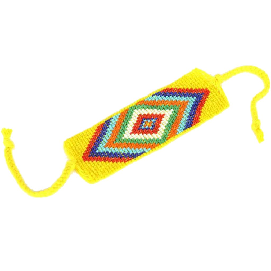 Yellow geometric beaded cuff bracelet by Ariel, showcasing modern design and colorful beaded details.