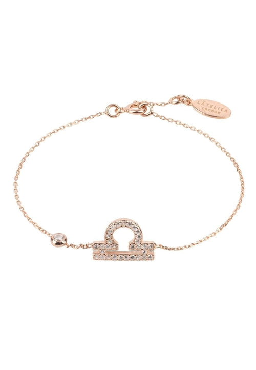 Gold Misty Libra zodiac horoscope star sign bracelet, silver-toned accessories with celestial star motifs.