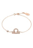 Gold Misty Libra zodiac horoscope star sign bracelet, silver-toned accessories with celestial star motifs.